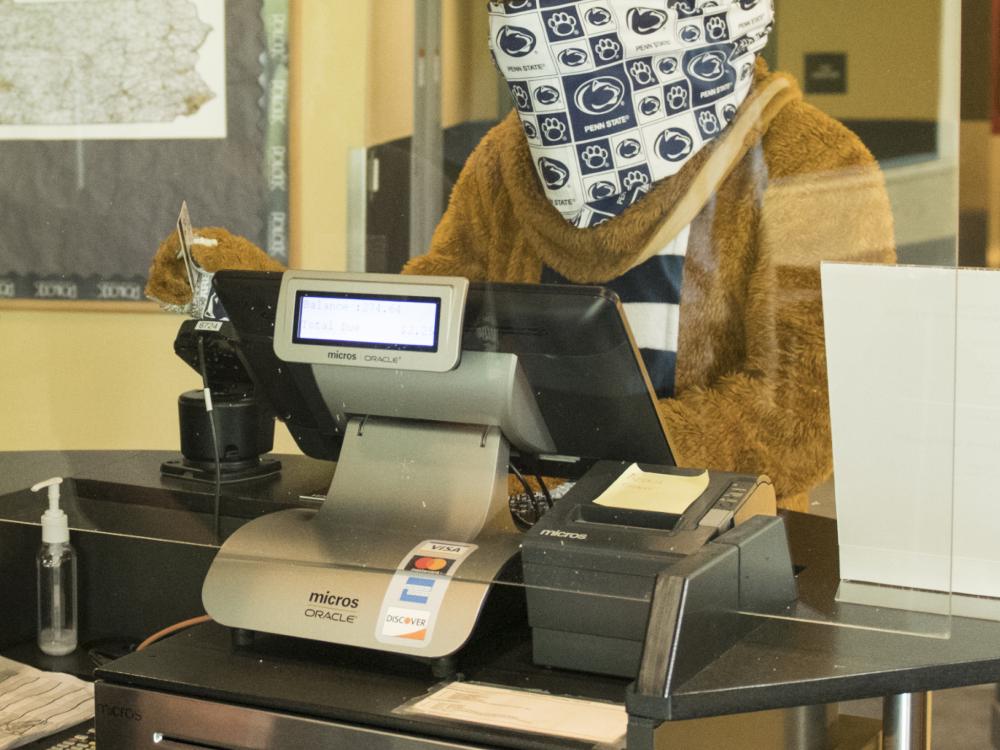 Nittany Lion swiping out hunger at the register in the dining commons