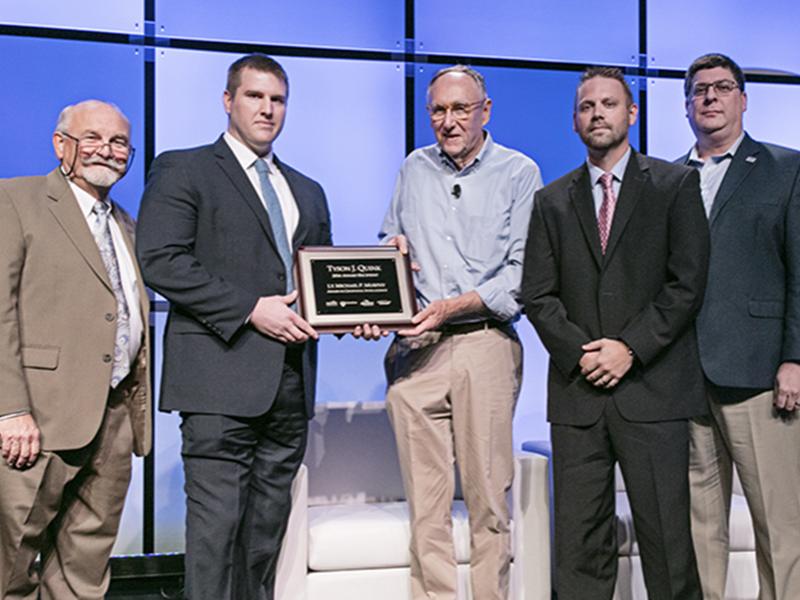 Quink receiving Murphy Award