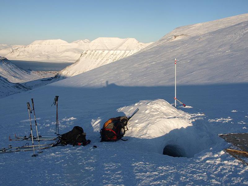 Ice cave entrance and camp