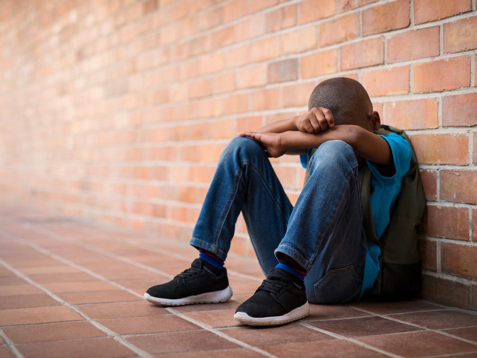 Young boy in trouble at school