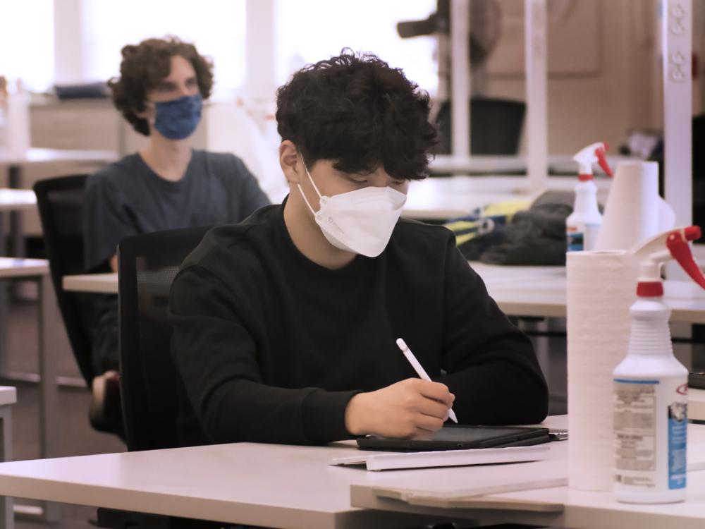 students in class with masks