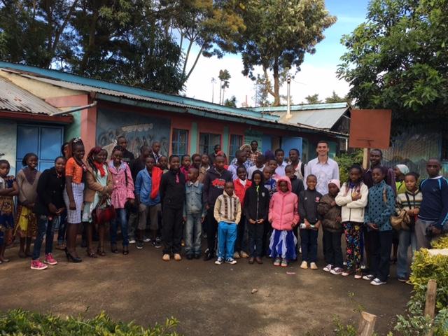 Nick Miller poses with group in Nairobi