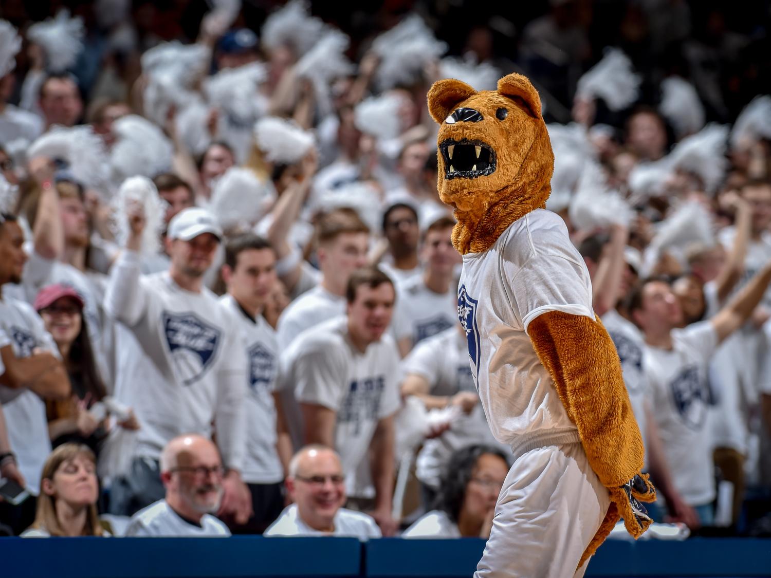 The Nittany Lion helps the Legion of Blue student section cheer for the men's basketball team