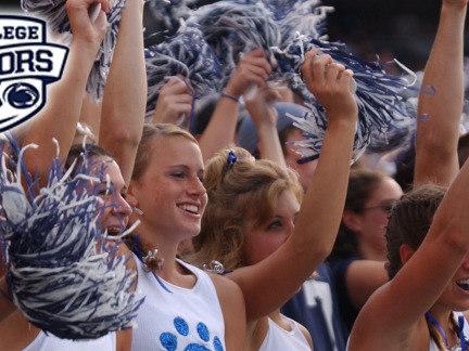 Fans in Beaver Stadium with College Colors Day logo
