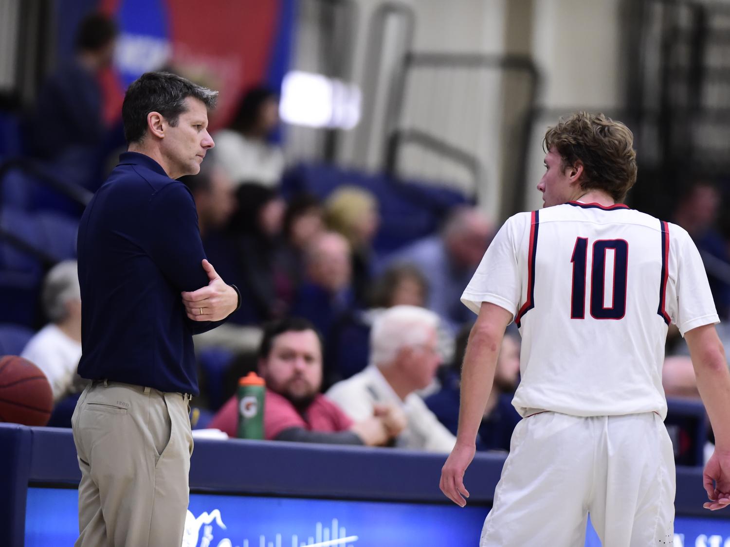 Dave Niland, at left, is in his 25th year as the coach of the Behrend Lions, having produced 24 consecutive winning seasons. For the past four seasons, that success has been shared with his son Andy Niland, at right, who has been the Lions’ starting point guard since joining the team in the fall of 2015.