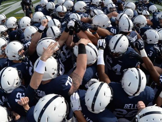 Football team huddle