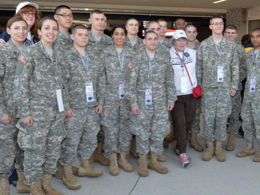 Military members pose for image