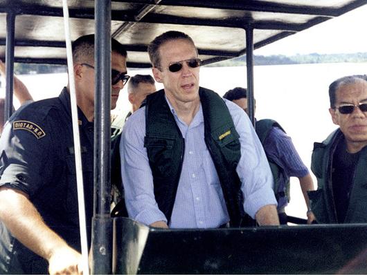 U.S. ambassador Dennis Jett on a boat