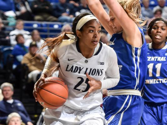 Peyton Whitted drives with ball