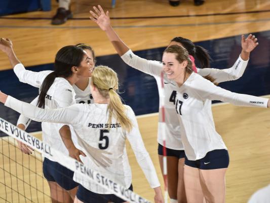 Volleyball players celebrate