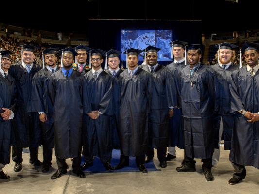 Football players at commencement