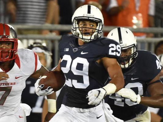 Penn State running back with ball