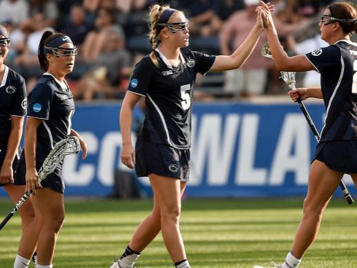 Penn State teammates high-five one another