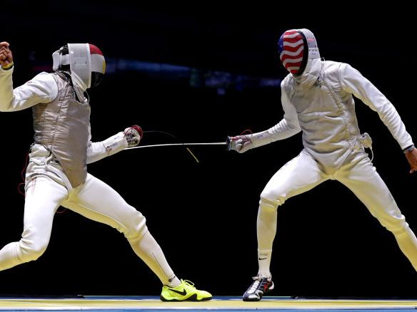 Chamley-Watson battles opponent in fencing