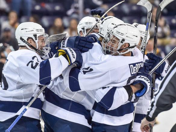 Players hug in celebration