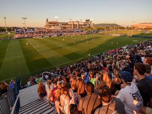 Crowd watches soccer match at Jeffrey Field