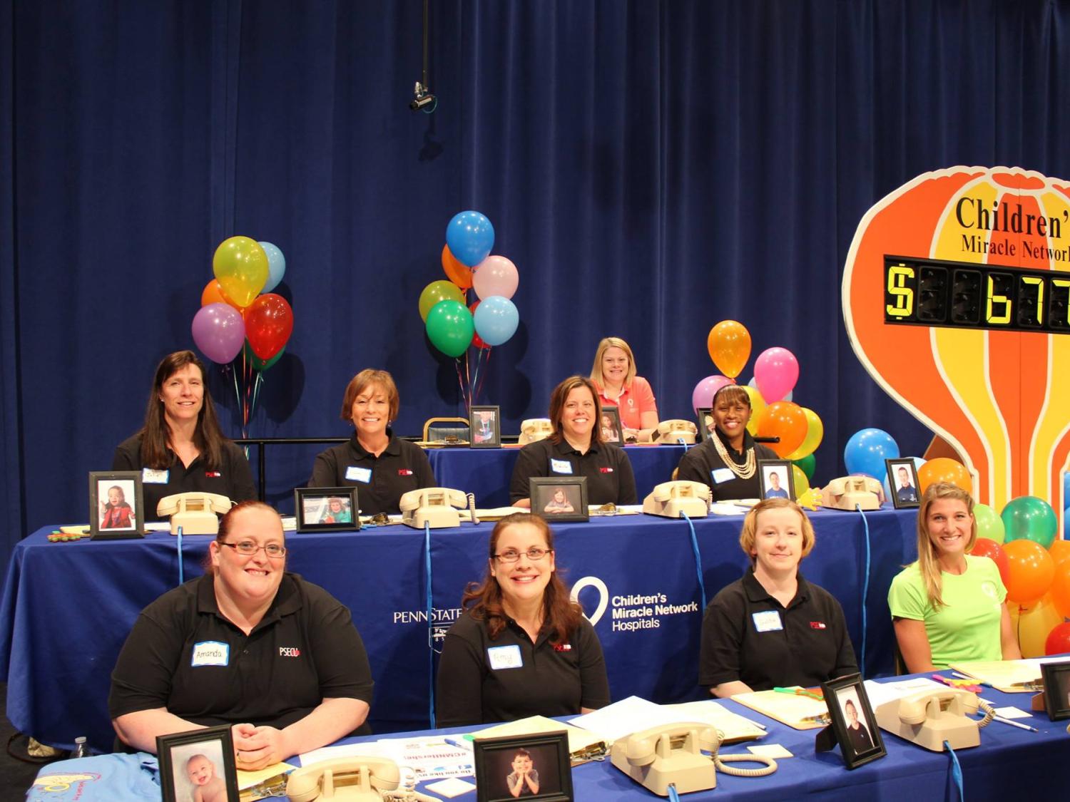 Volunteers take calls at the CMN Telethon.