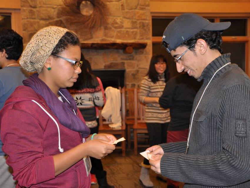 Penn State alumna Jei-leya Hassan, left, who attended GELE in fall 2013, participates in a group exercise during the retreat.