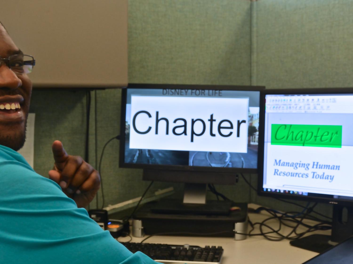 Man at computer screen with enlarged text