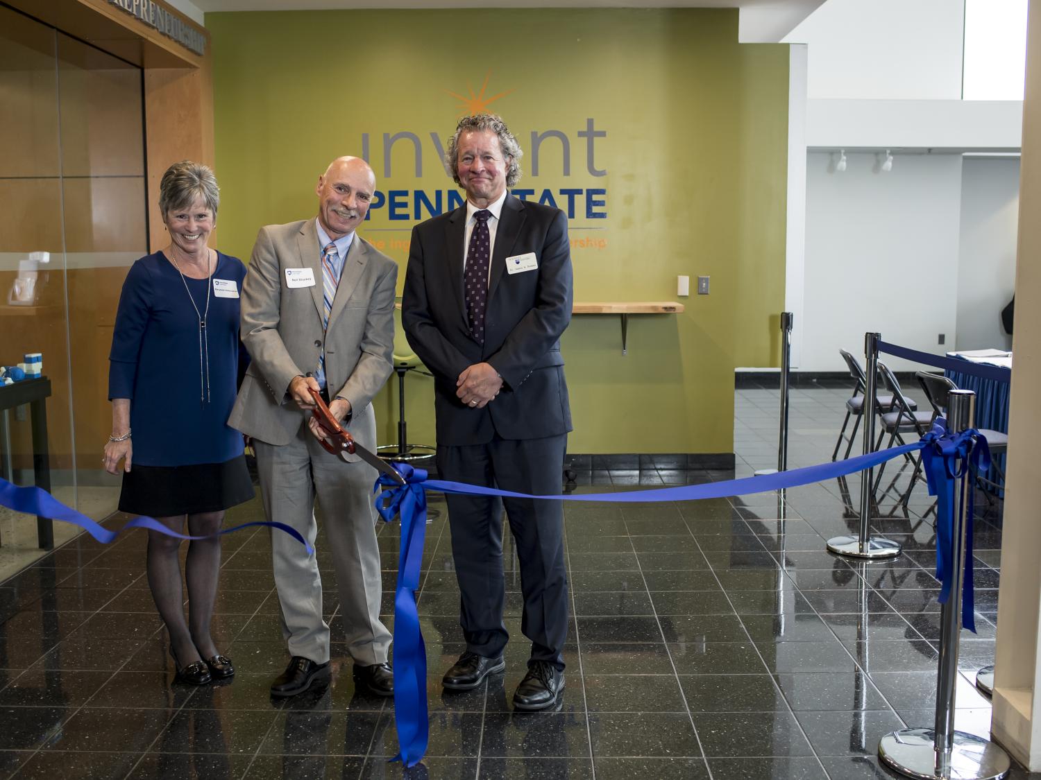 Marybeth DiVencenzo, Neil Sharkey, and James Nemes cut the ribbon to inaugurate the REV-UP Center for Entrepreneurship