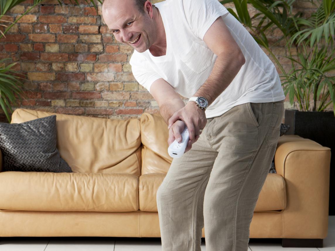man playing Wii 