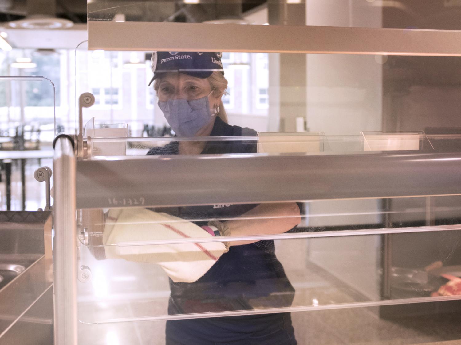 employee masked at dining hall