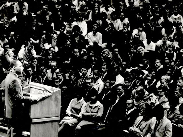 Martin Luther King, Jr. addresses a crowd at Penn State University Park's Rec Hall