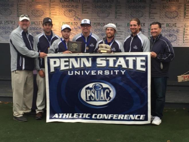 Men's Golf team post with a banner