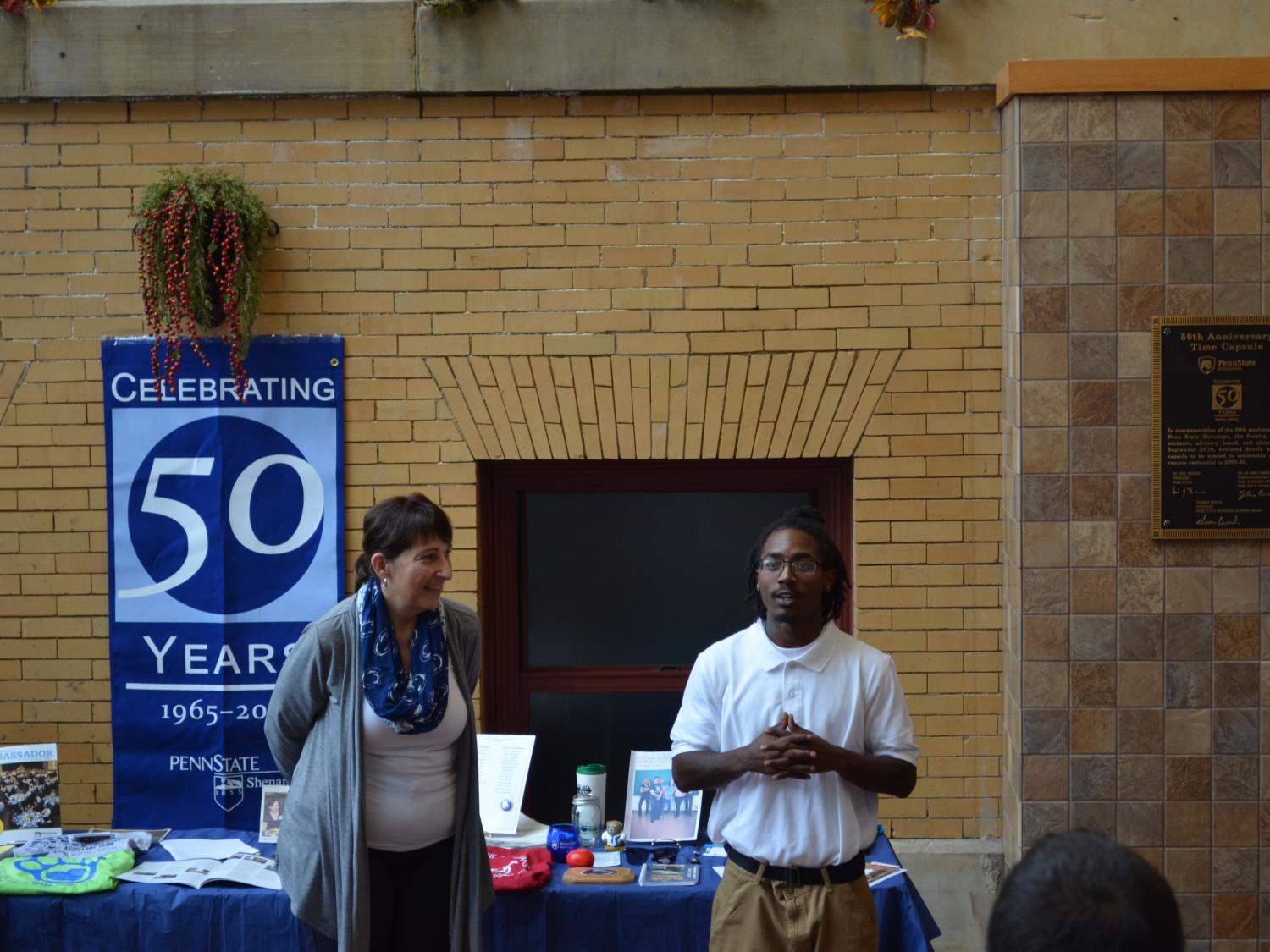 Dr. Jo Anne Carrick, campus director, stands with Alijah Douglas, president, SGA, at the Time Capsule ceremony on Sept. 14.