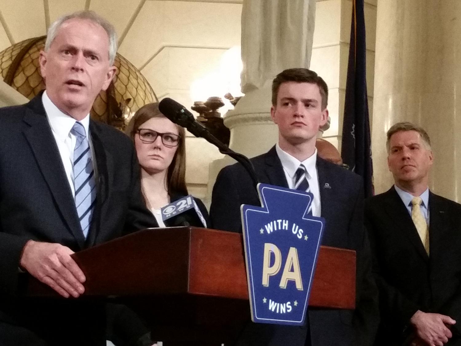 Penn State Executive Vice President and Provost Nicholas P. Jones at a podium in the rotunda of the state Capitol in Harrisburg, Pa.