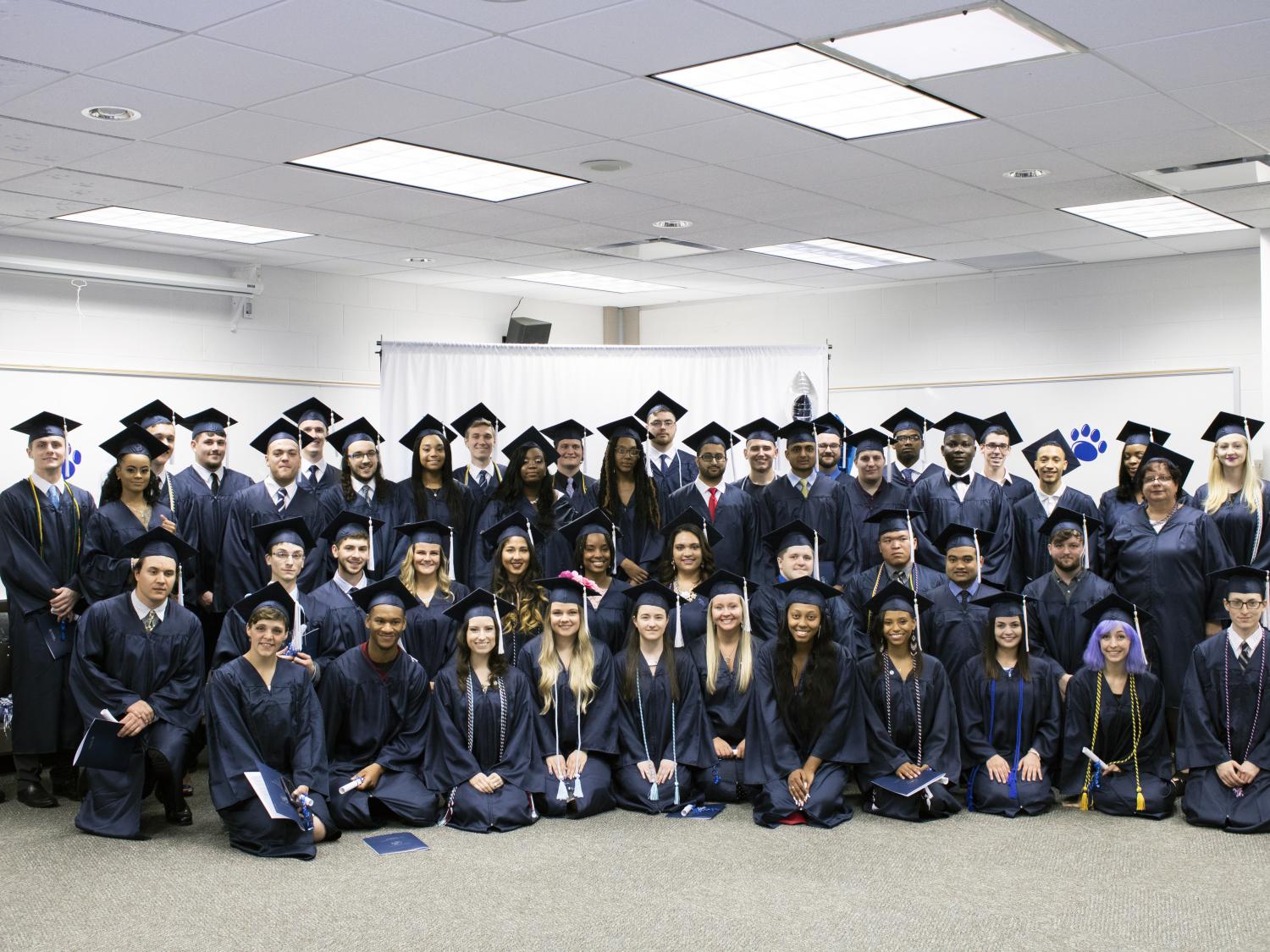 Penn State Greater Allegheny Class of 2018 Graduates wearing their caps and gowns