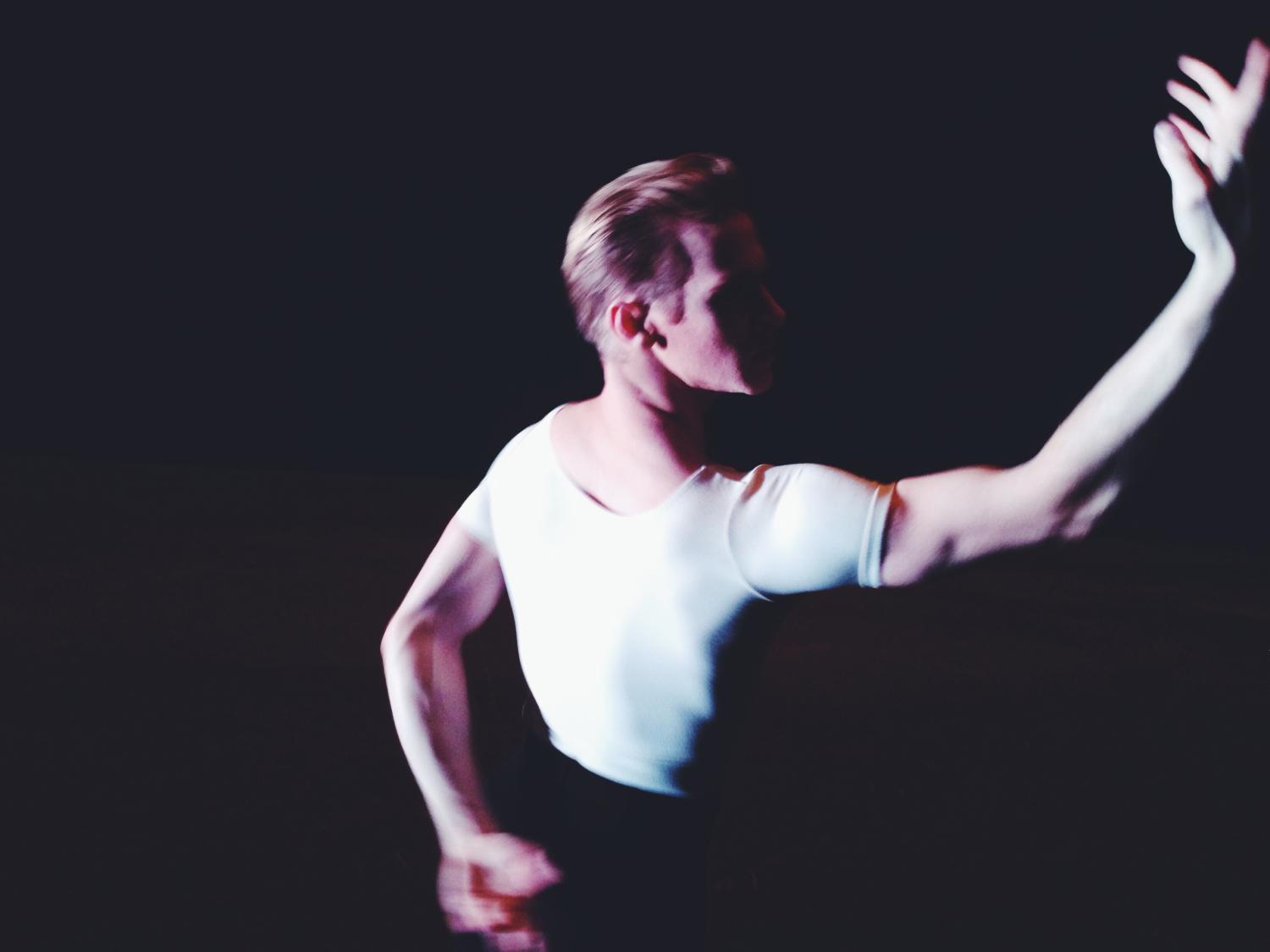 Ballet dancer with arm raised