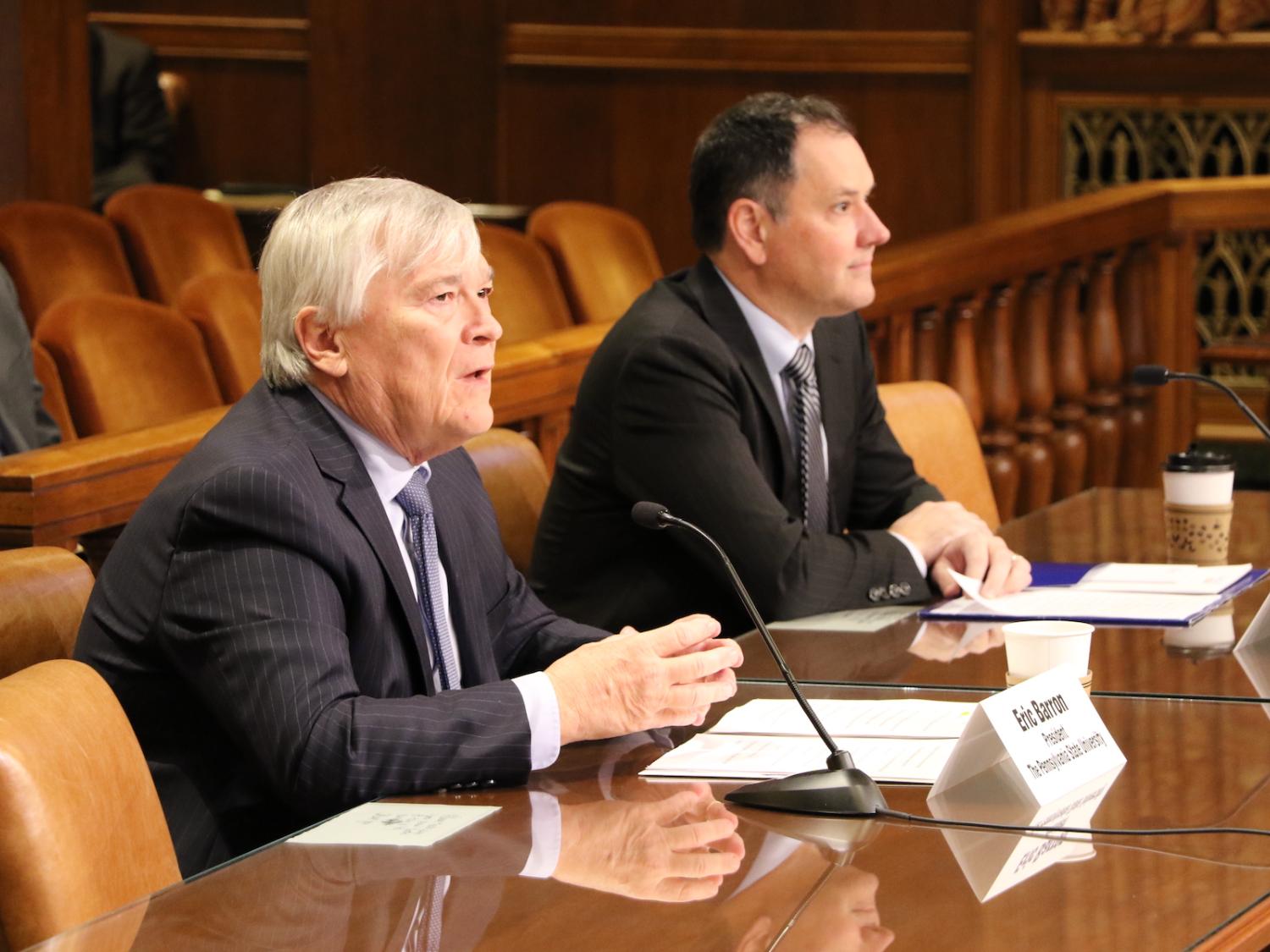 Penn State President Eric Barron and James Delattre address lawmakers at the state Capitol in Harrisburg. 