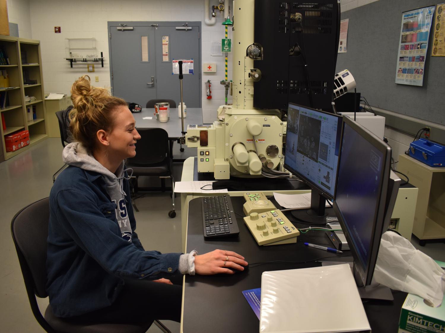 Penn State DuBois Engineering Student Nicolette Brossard examines properties of powder metal material under a scanning electronic microscope. 