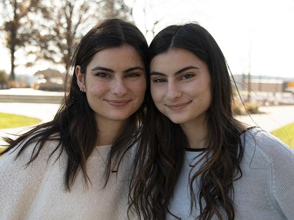 Emily Franks (left) and Sarah Franks (right), twin sisters, will graduate early from Penn State Fayette in December 2021.