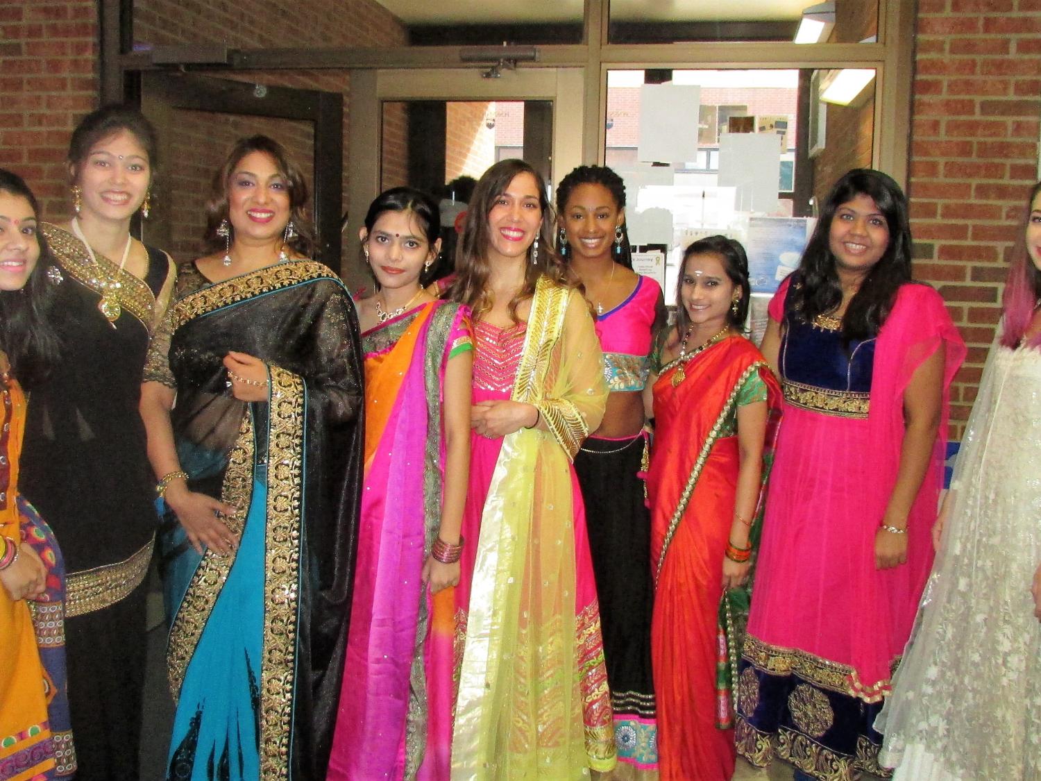 a group of female Indian students dressed in formal gowns for Diwali 2019
