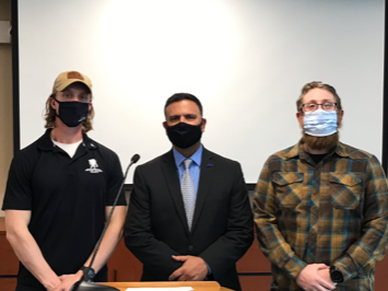 Penn State student veterans pose with Rocco Zegalia. 