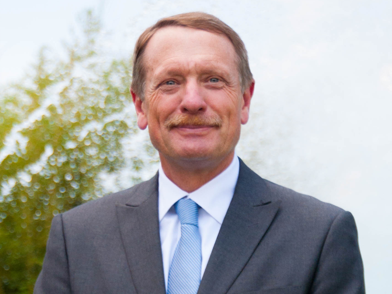 image of John Hoh smiling