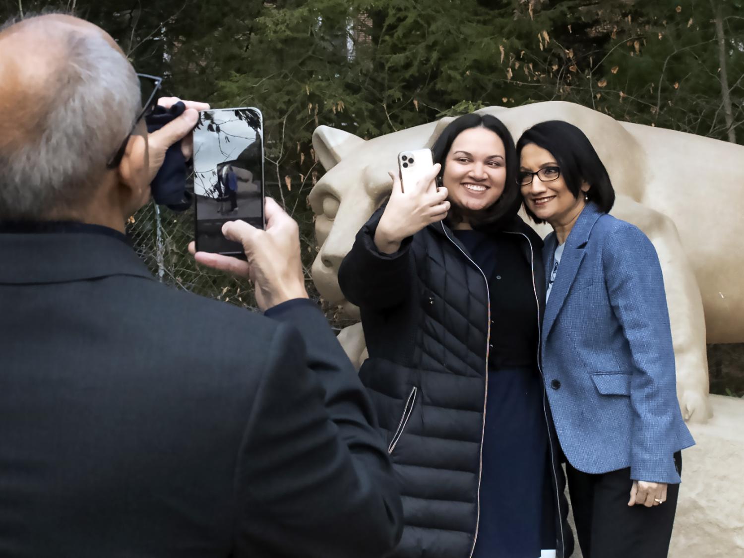 The Bendapudi family takes selfies at the Lion shrine