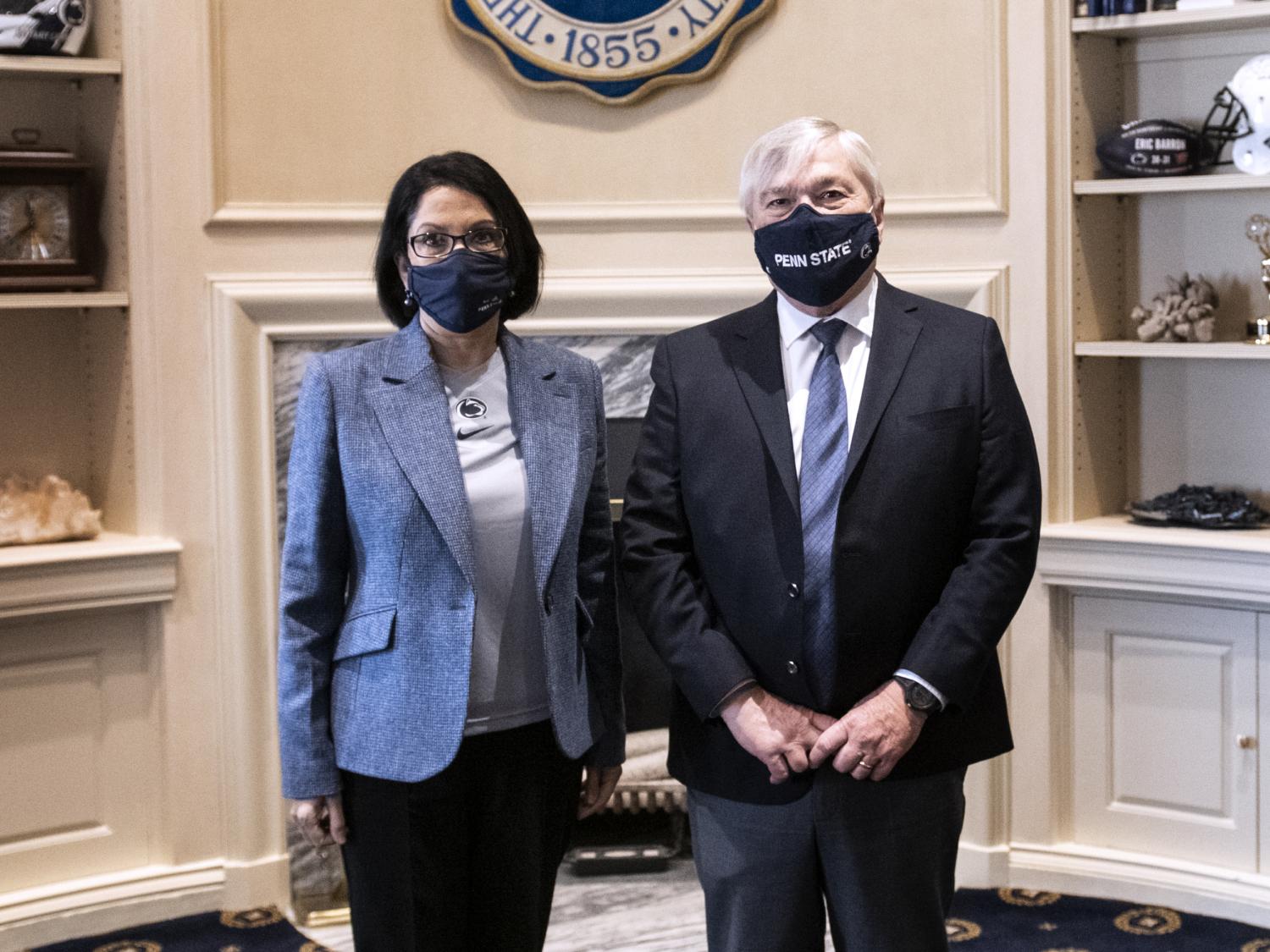 President Eric Barron and President-elect Neeli Bendapudi stand together. 