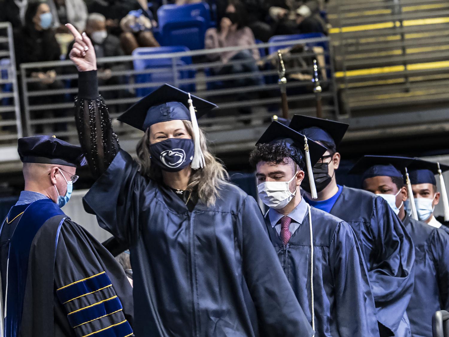 Students on stage at commencement
