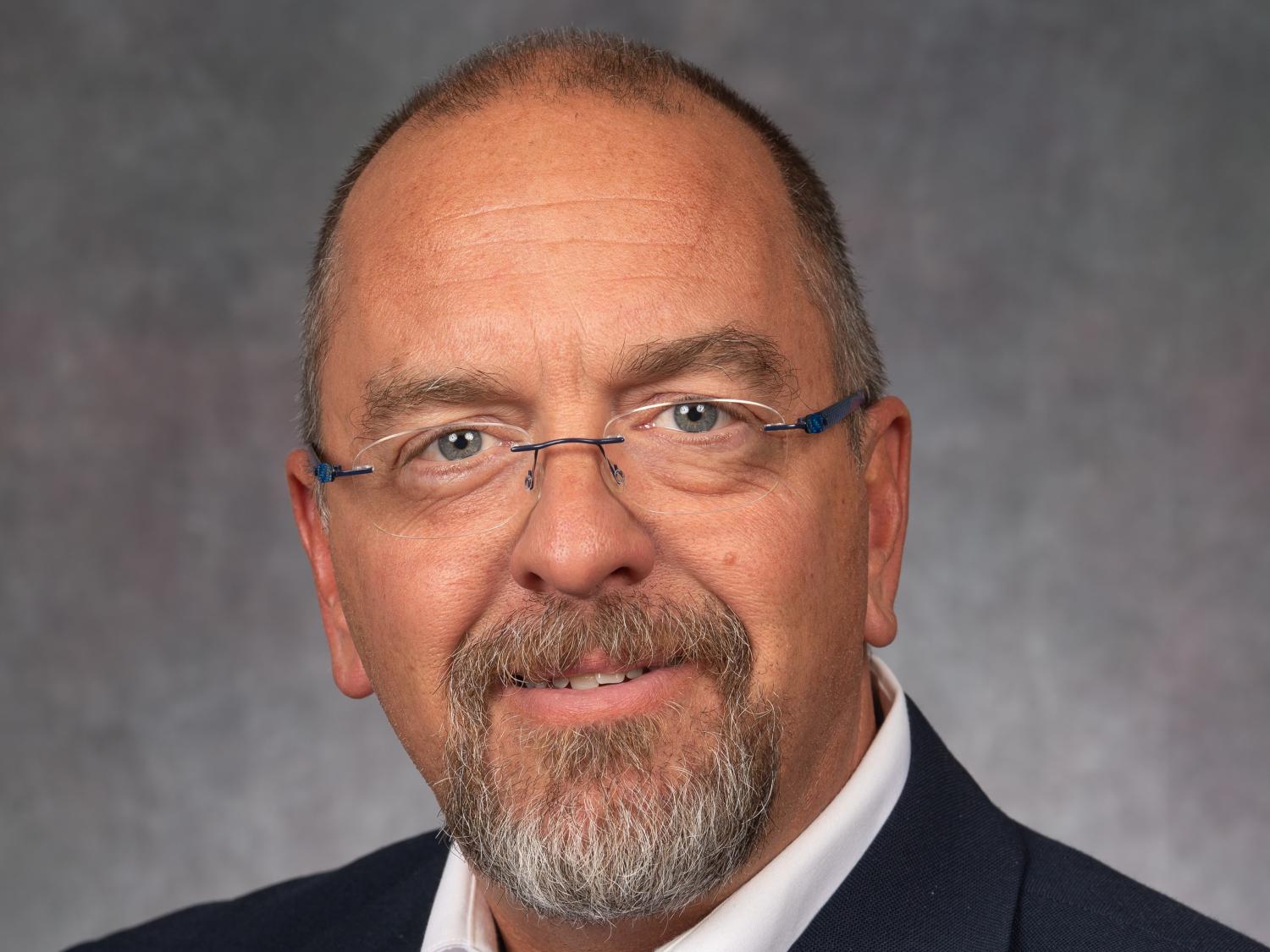 A portrait of Penn State Behrend faculty member Christopher Harben.