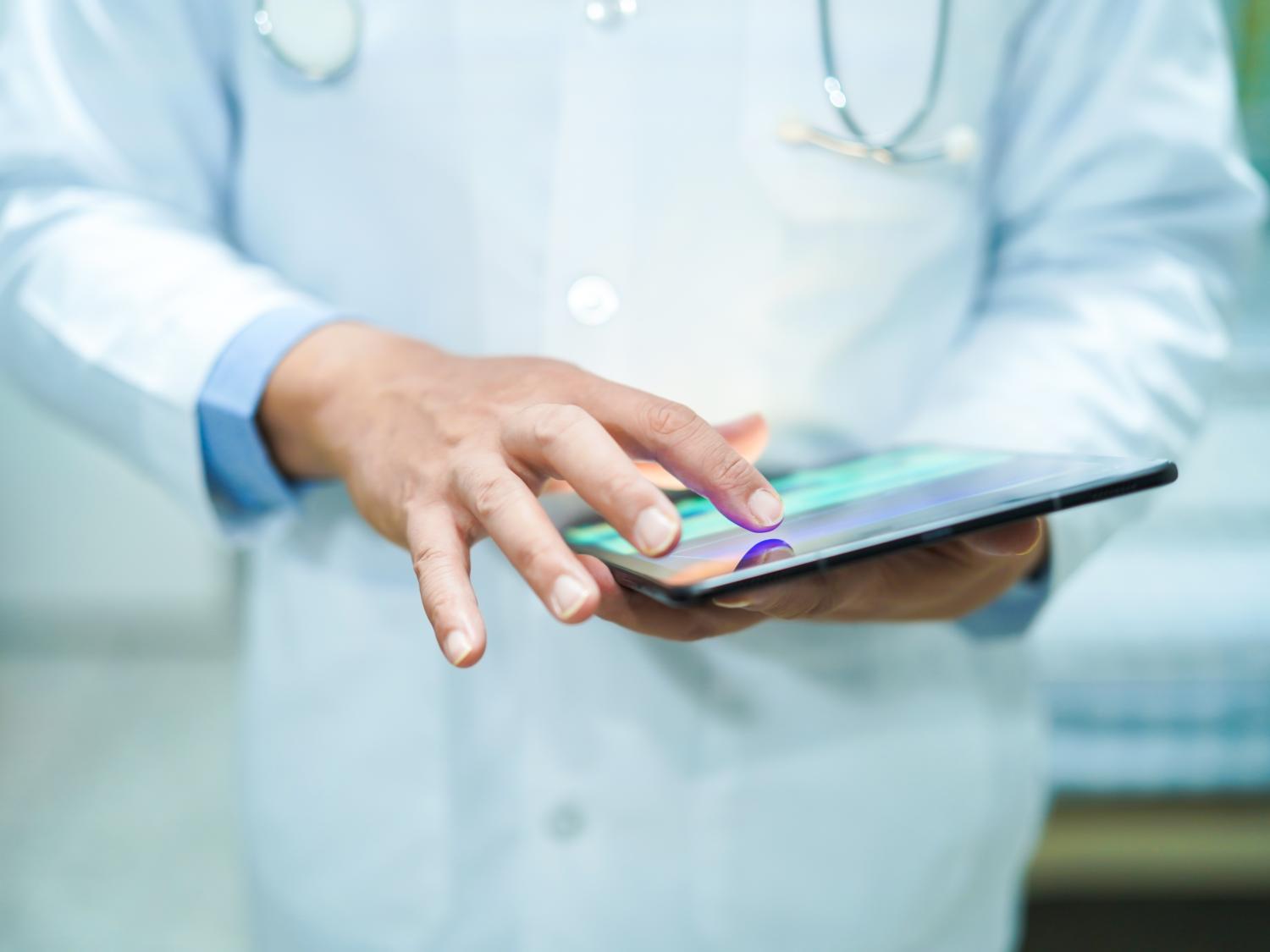 guy holding tablet
