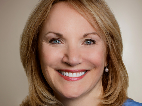 Nichola Gutgold posing for headshot 