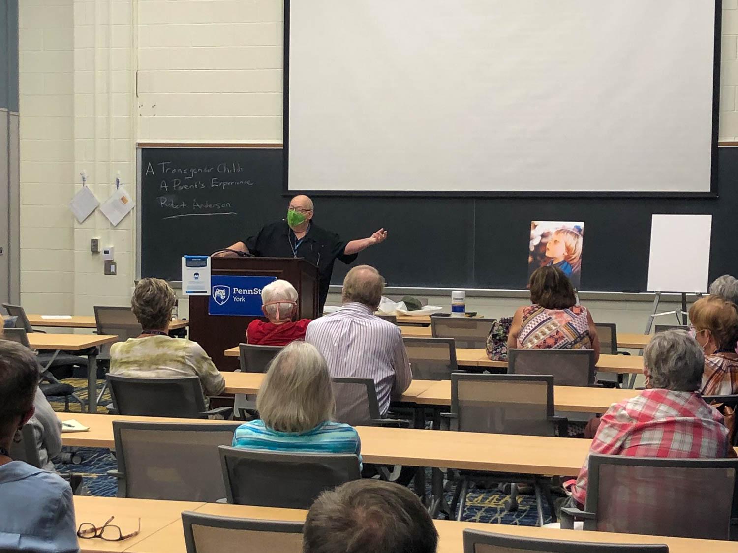 OLLI class being taught by faculty member wearing a mask