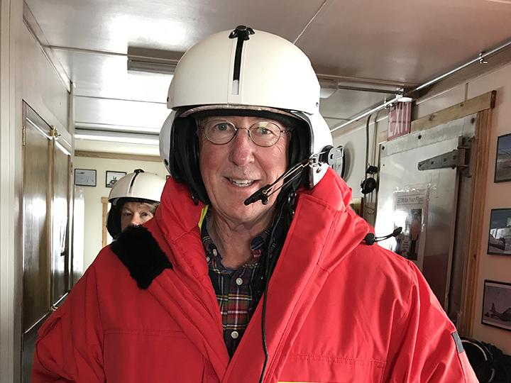 William Easterling prepares to board a helicopter in Antarctica to tour research sites out on the continent. 