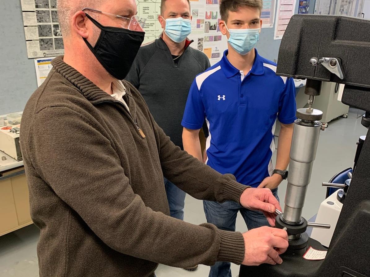 Testing powder metal samples in the Penn State DuBois engineering labs. 