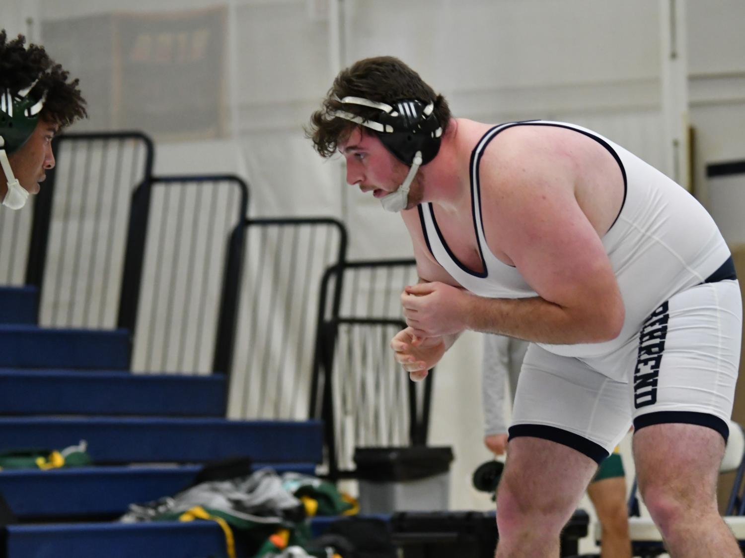 Penn State Behrend wrestler Joe Newara faces an opponent.
