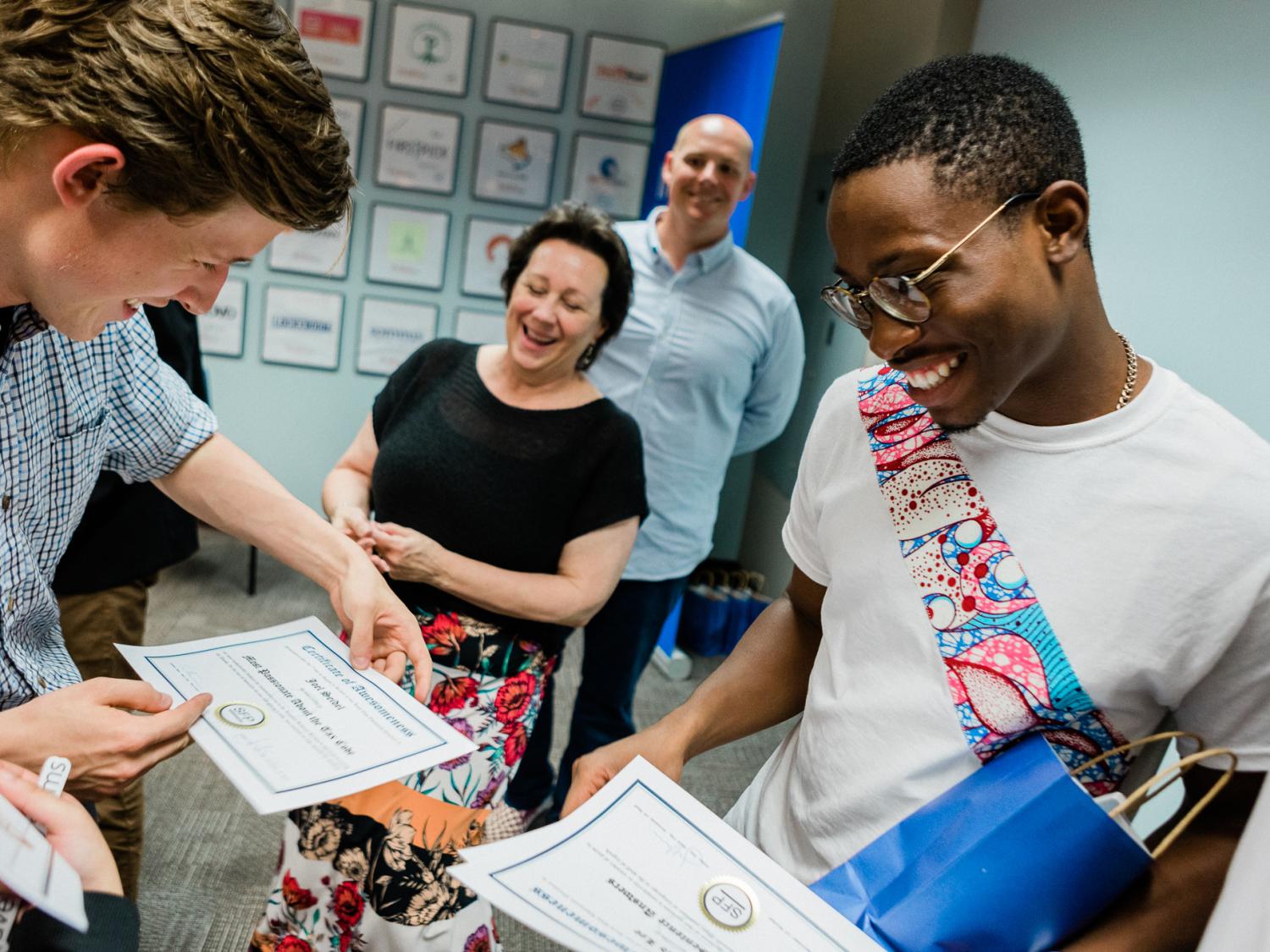 Summer Founders participant with certificate