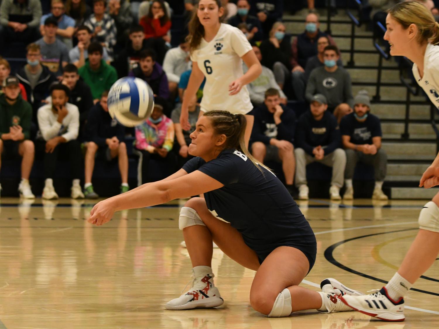 Penn State Behrend volleyball player Maddie Clapper hits a dig during a game.